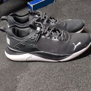 Puma Black and White Athletic Shoes with Sleek Design